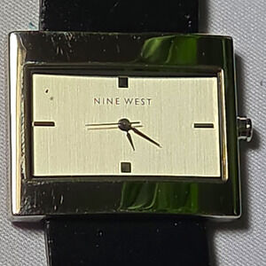 Nine West Women’s Quartz Analog Rectangle Watch Silver Dial Black Leather Strap